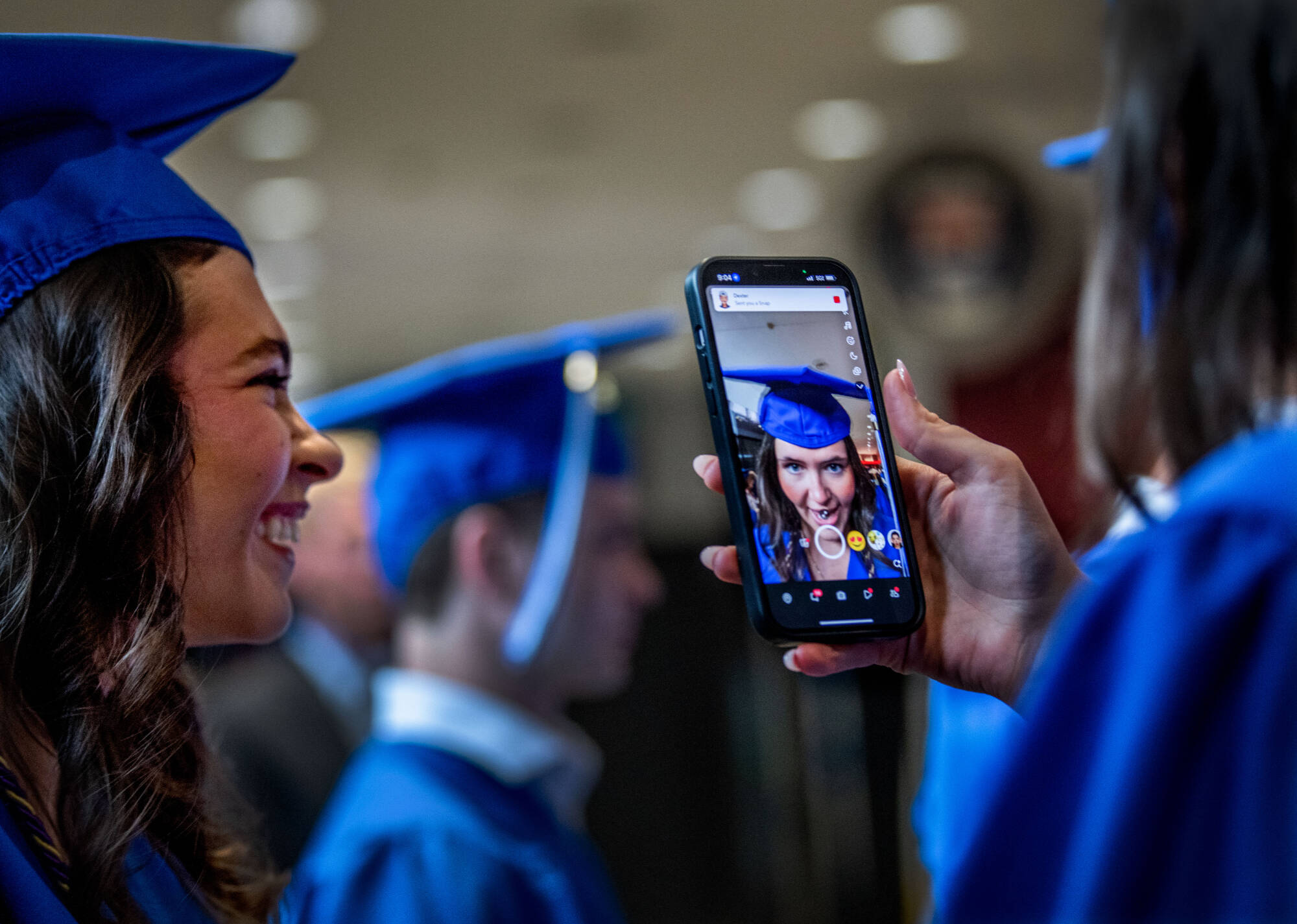 Students in caps and gowns for commencement